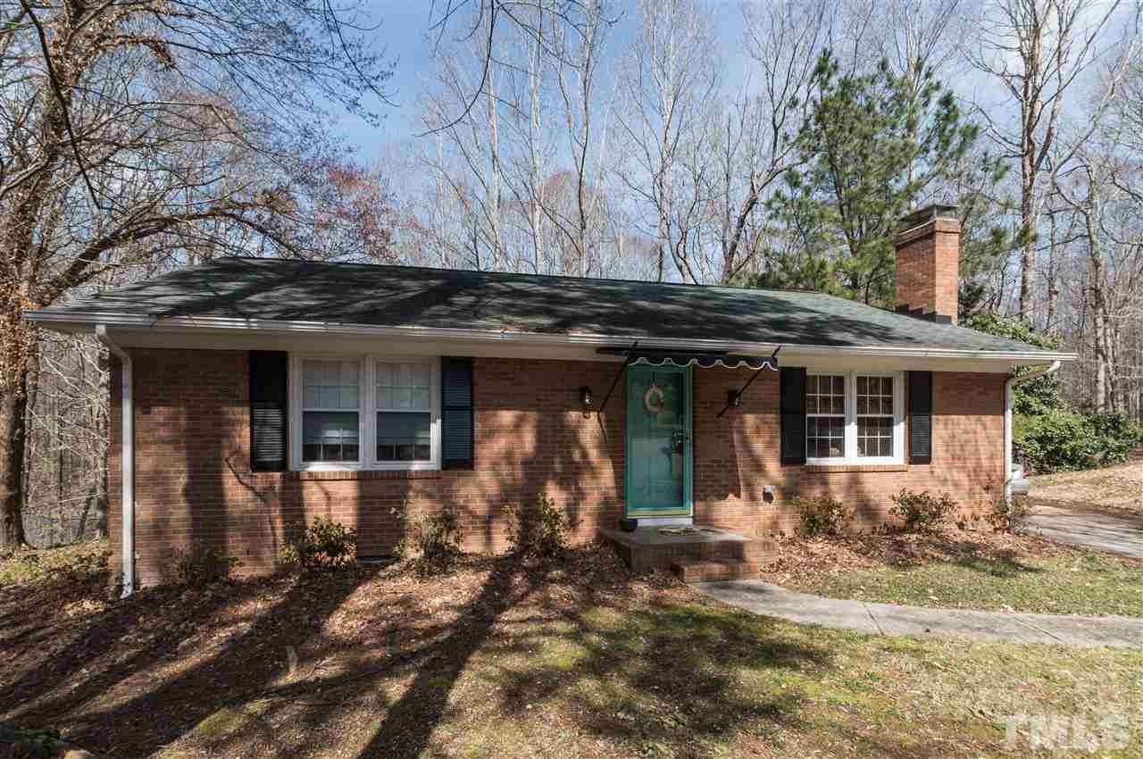 1108 Mockingbird Drive Raleigh, NC 27615 - Photo 21 of 21 a front view of a house with garden