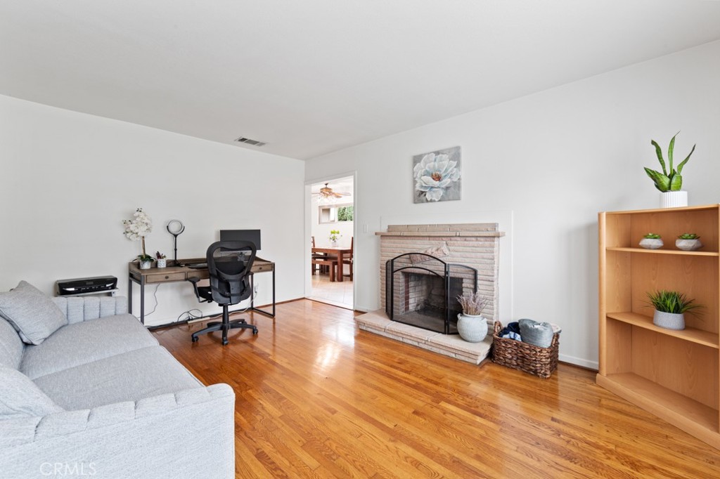 4425 Walnut Avenue Long Beach, CA 90807 - Photo 2 of 50 a view of a livingroom with workspace and a couch