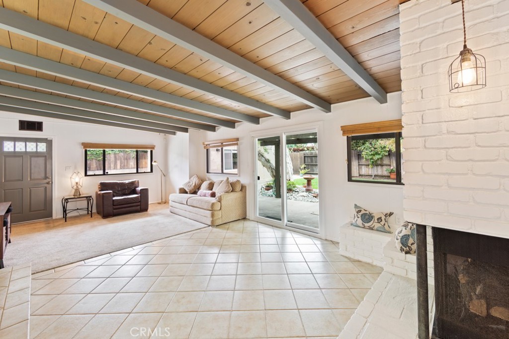 4425 Walnut Avenue Long Beach, CA 90807 - Photo 29 of 50 a spacious bedroom with a bed a table and chair
