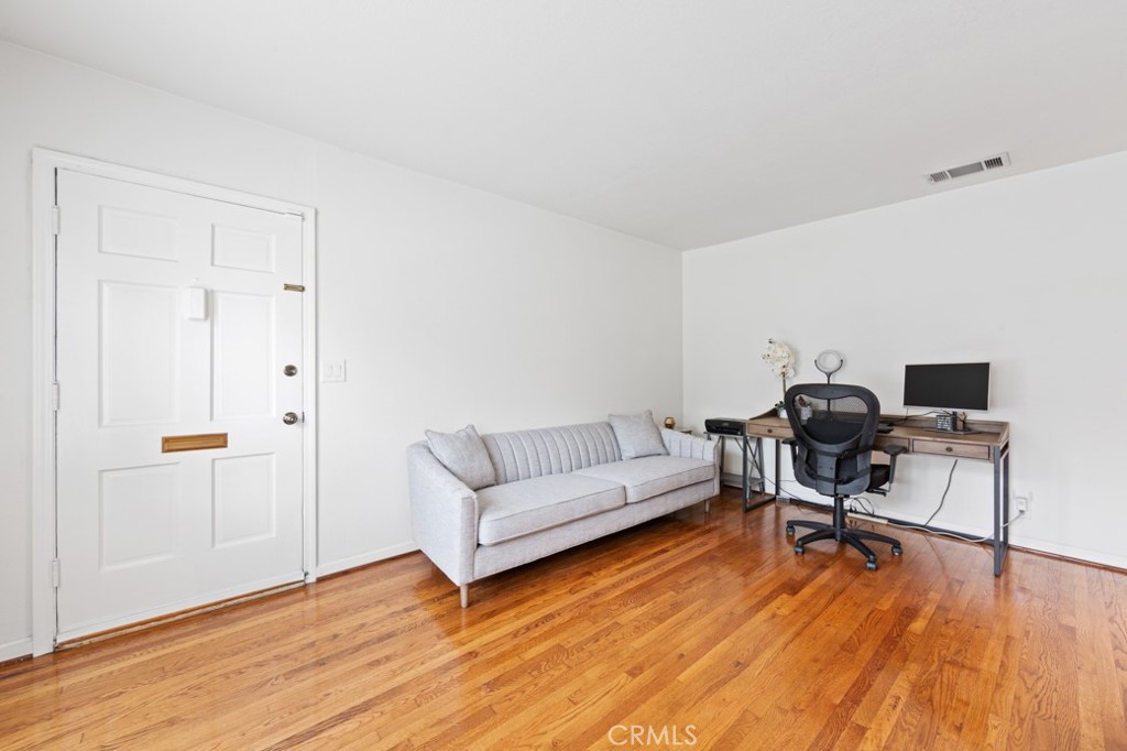 4425 Walnut Avenue Long Beach, CA 90807 - Photo 3 of 50 a living room with furniture and a wooden floor