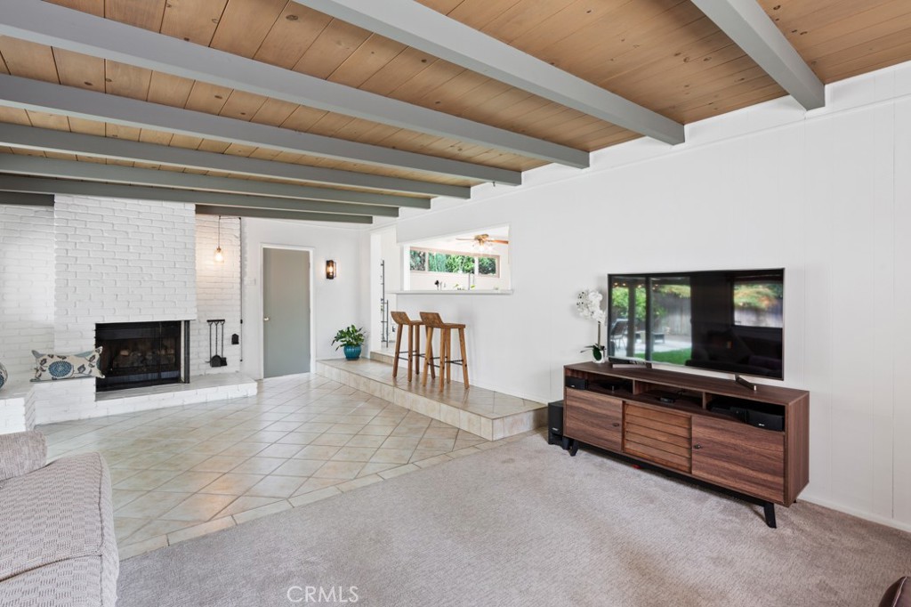 4425 Walnut Avenue Long Beach, CA 90807 - Photo 32 of 50 a living room with furniture and a flat screen tv