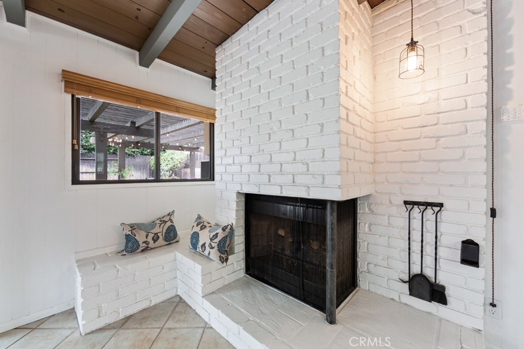 4425 Walnut Avenue Long Beach, CA 90807 - Photo 36 of 50 a living room with furniture and a fireplace