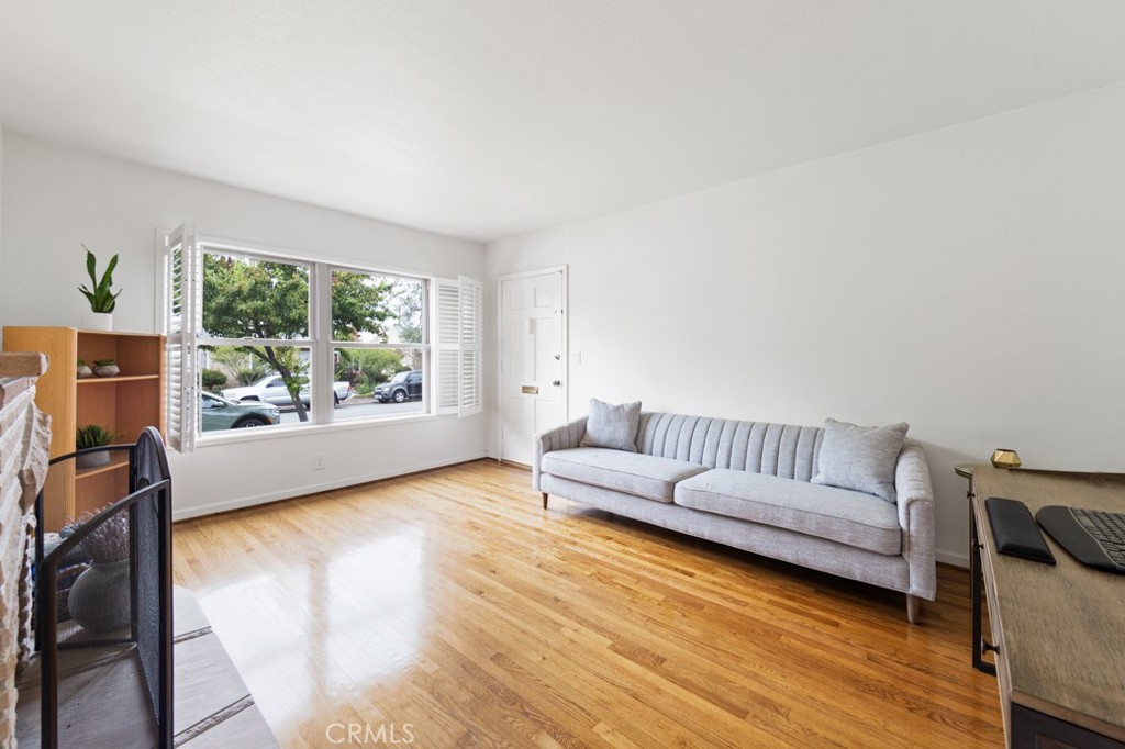 4425 Walnut Avenue Long Beach, CA 90807 - Photo 4 of 50 a living room with furniture and a large window