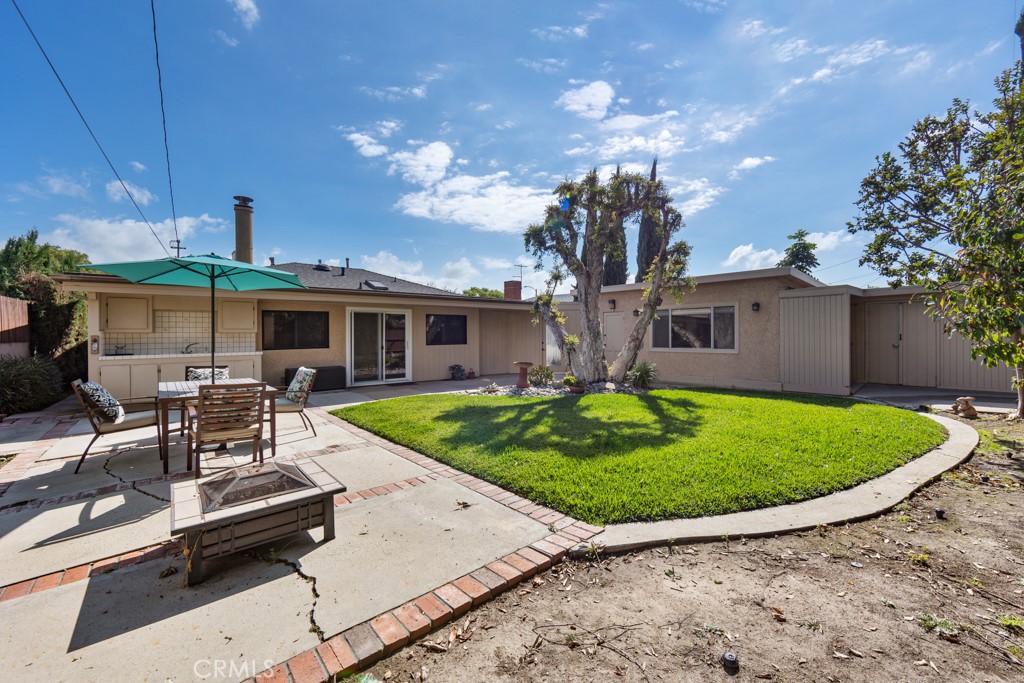 4425 Walnut Avenue Long Beach, CA 90807 - Photo 44 of 50 a view of a house with backyard porch and sitting area