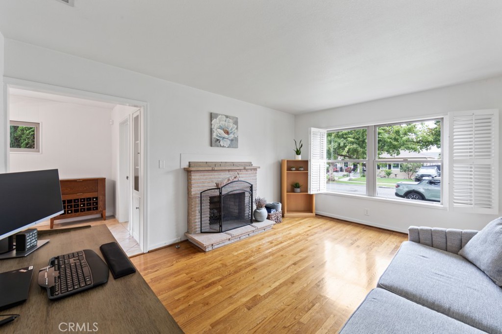 4425 Walnut Avenue Long Beach, CA 90807 - Photo 5 of 50 a living room with furniture and a fireplace