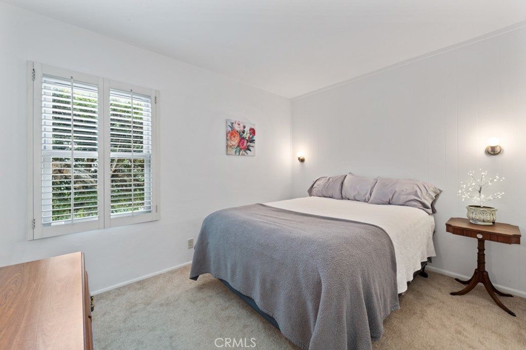 4425 Walnut Avenue Long Beach, CA 90807 - Photo 10 of 50 a bedroom with a bed and a window