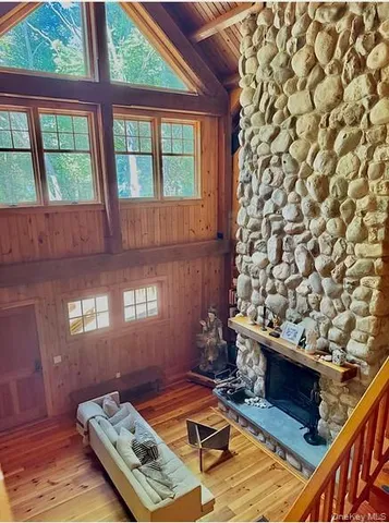 a living room with a couch next to a window