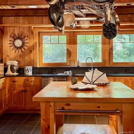 a kitchen with a stove and a microwave