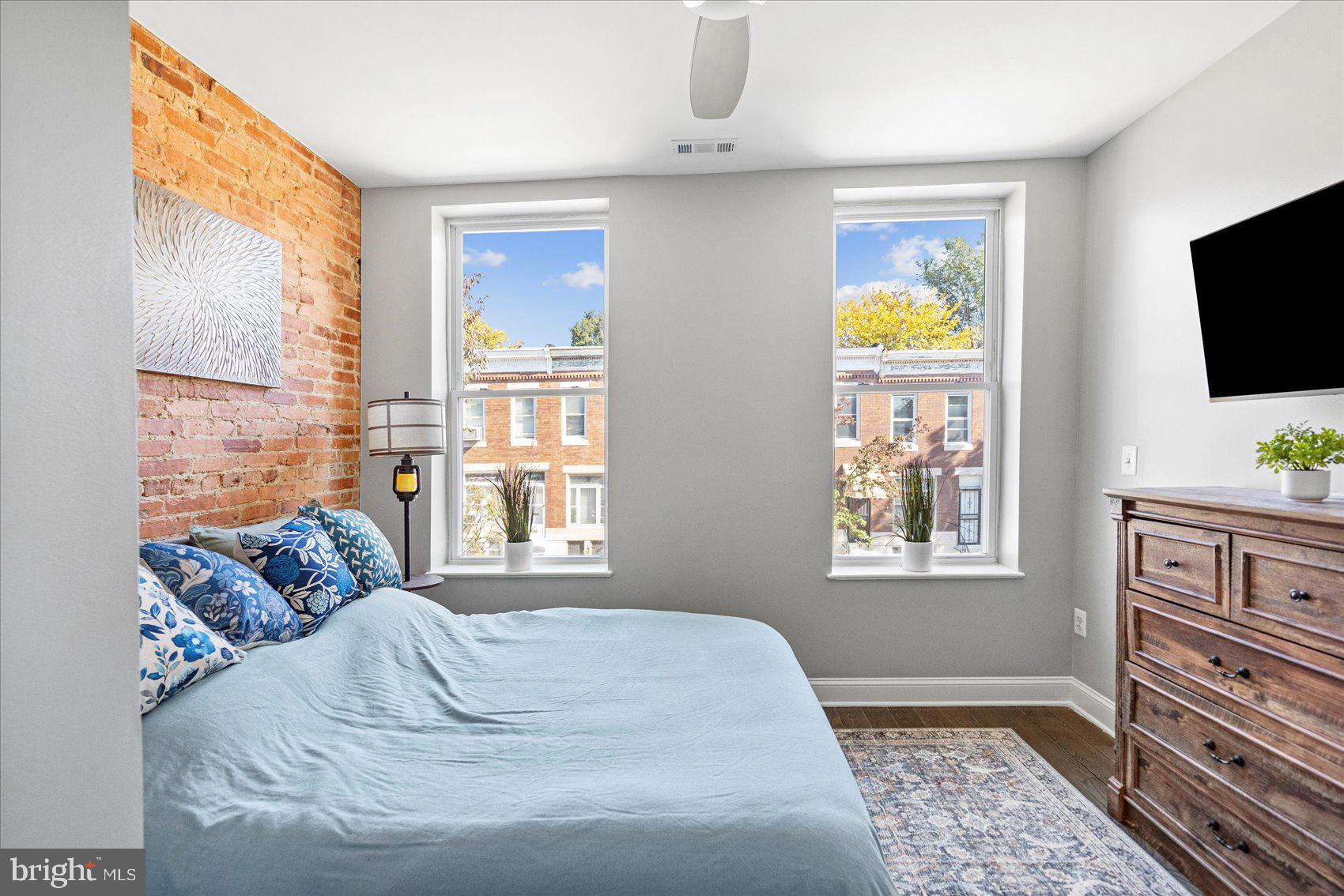 2428 McCulloh Street Baltimore, MD 21217 - Photo 18 of 42 a bedroom with furniture and a window