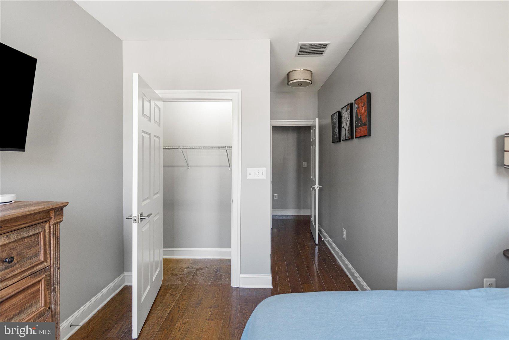 2428 McCulloh Street Baltimore, MD 21217 - Photo 19 of 42 a view of hallway with wooden floor and staircase