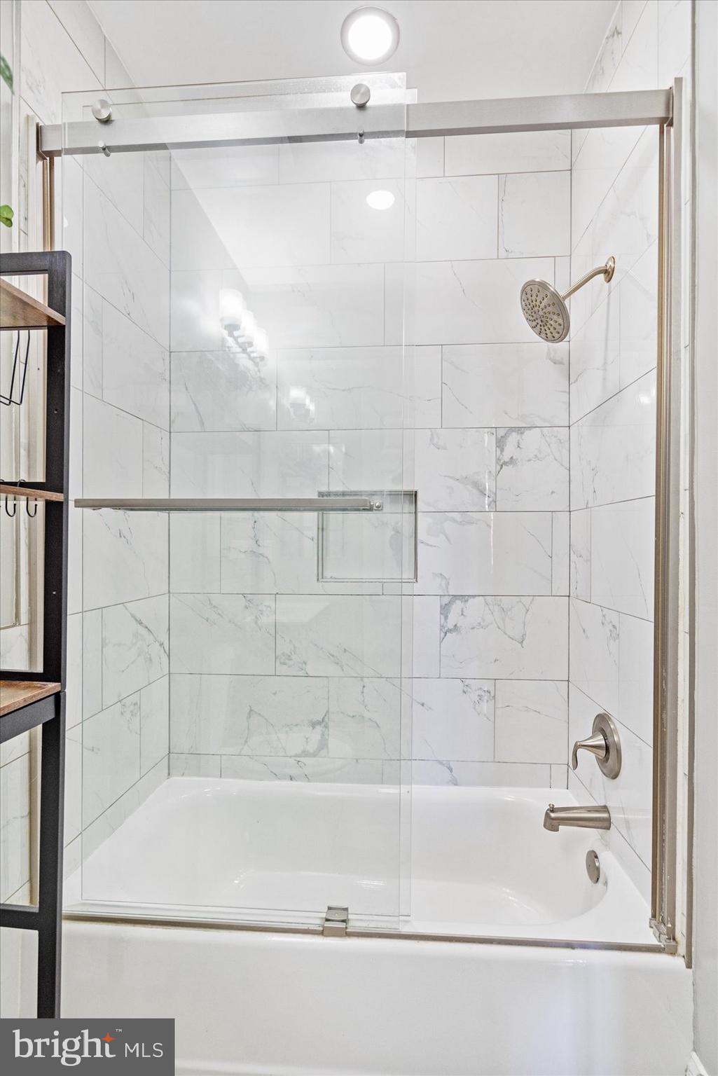 2428 McCulloh Street Baltimore, MD 21217 - Photo 21 of 42 a bathroom with a shower and a bath tub