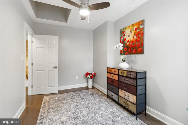 an entryway with wooden floor