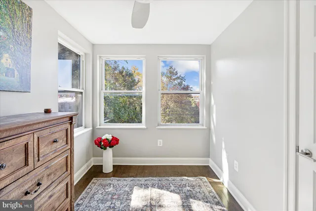 a bath room with a window