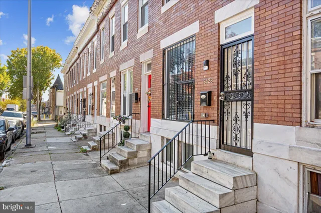 a view of a building with sitting area