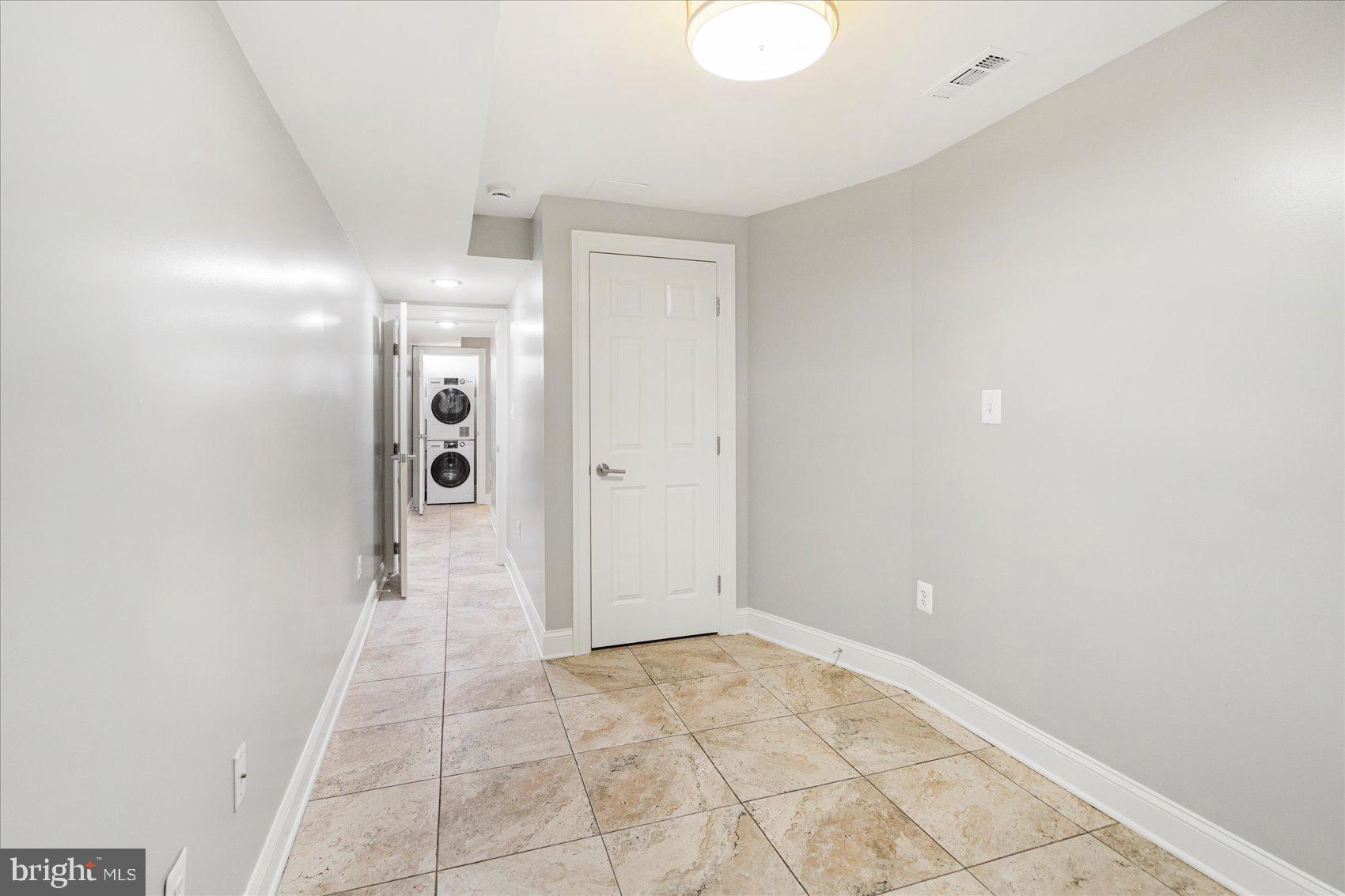 2428 McCulloh Street Baltimore, MD 21217 - Photo 35 of 42 a view of a bathroom with a shower and a sink