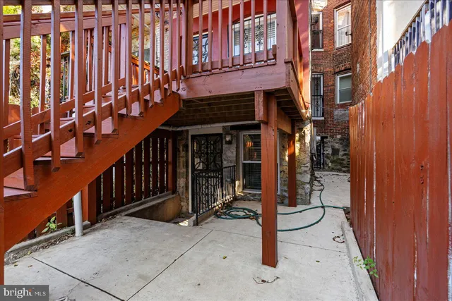 a view of a brick building with many windows