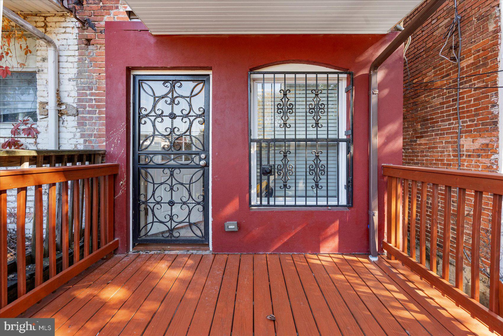 2428 McCulloh Street Baltimore, MD 21217 - Photo 39 of 42 a view of front door with wooden floor