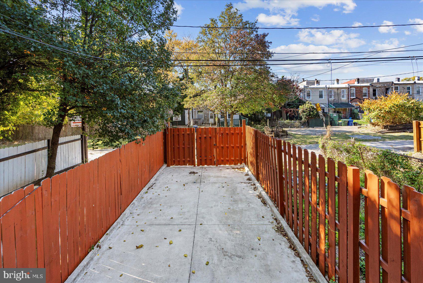 2428 McCulloh Street Baltimore, MD 21217 - Photo 41 of 42 a view of a pathway with a wrought fence
