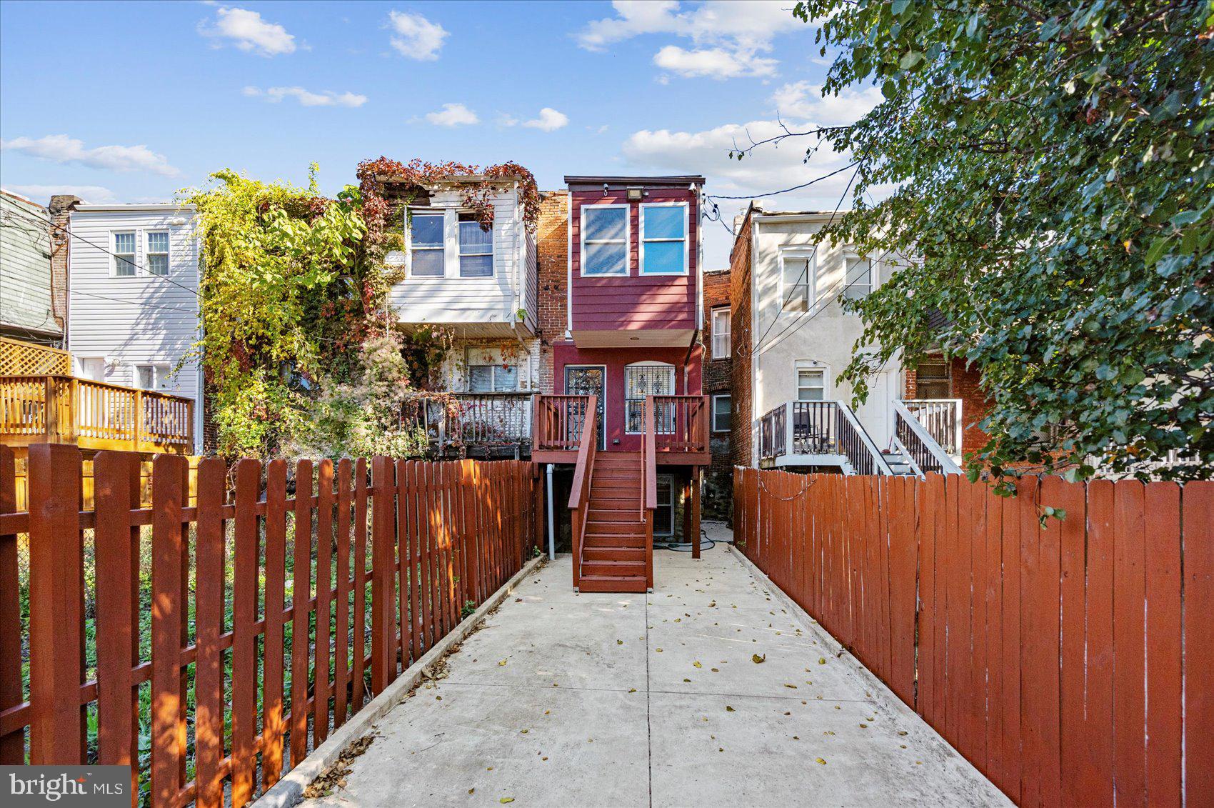 2428 McCulloh Street Baltimore, MD 21217 - Photo 42 of 42 a view of a brick house with large windows