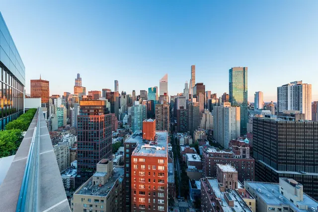 a view of a terrace with sitting area