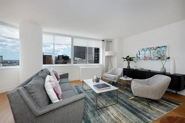 a living room with furniture and a couch