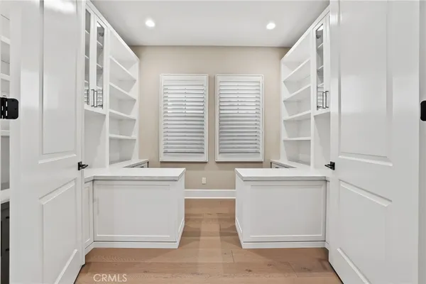 a view of cabinets and window