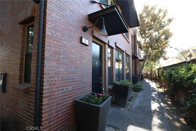 a view of a backyard with sitting area