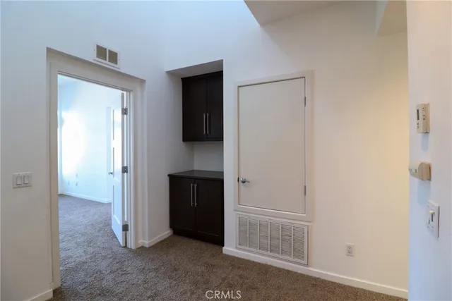 a view of hallway with sink