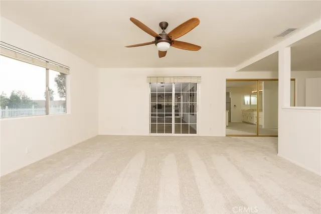 a bathroom with a granite countertop sink mirror and double