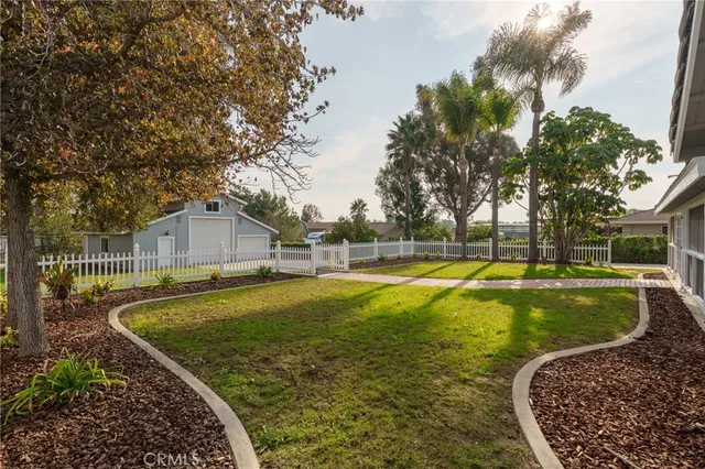 a view of a backyard of the house