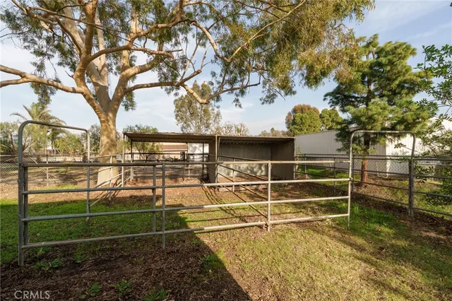 an aerial view of multiple houses with yard