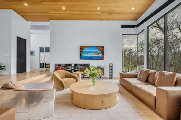 a kitchen with stainless steel appliances kitchen island granite countertop a refrigerator and a stove