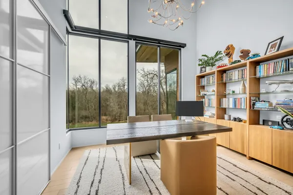 a kitchen with stainless steel appliances granite countertop a sink and a stove