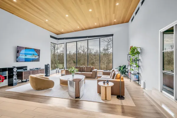 a kitchen with stainless steel appliances a refrigerator and microwave