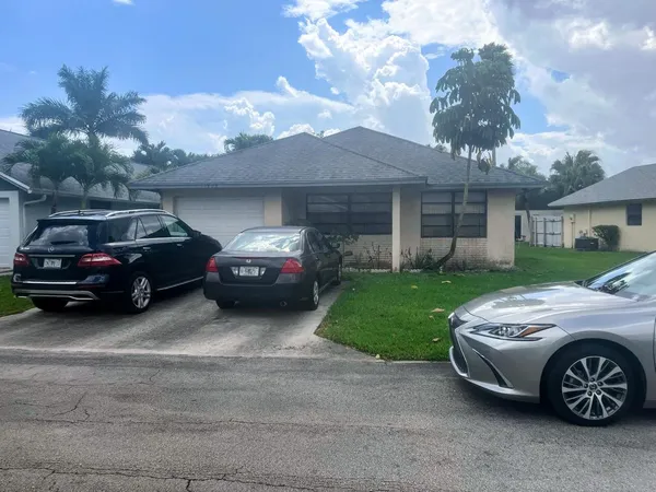 a car parked in front of a house