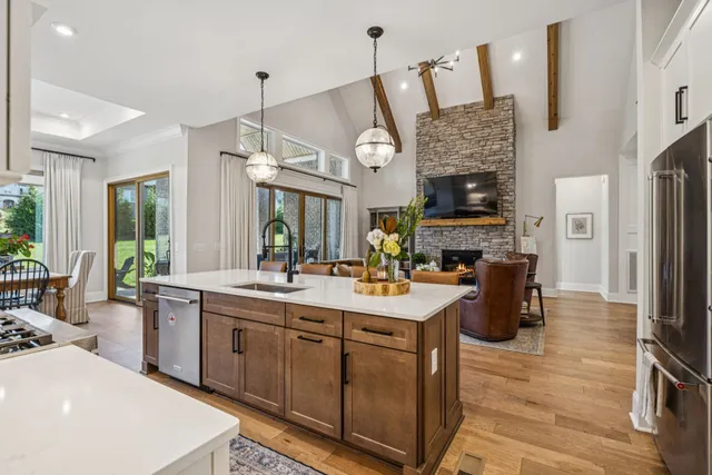 a bedroom with furniture and a flat screen tv