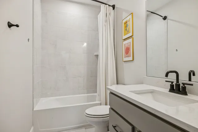 an aerial view of a house with pool yard and outdoor seating