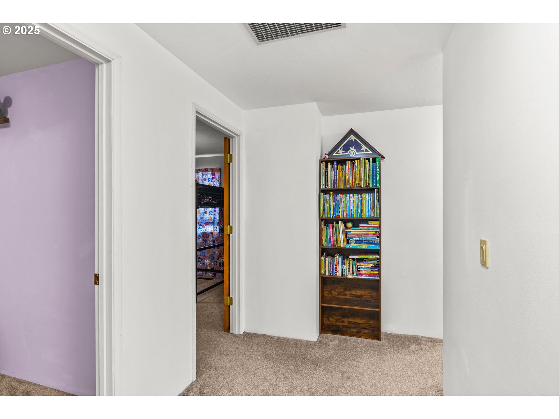289 73rd Place Springfield, OR 97478 - Photo 16 of 32 a living room with painting on the wall and a window