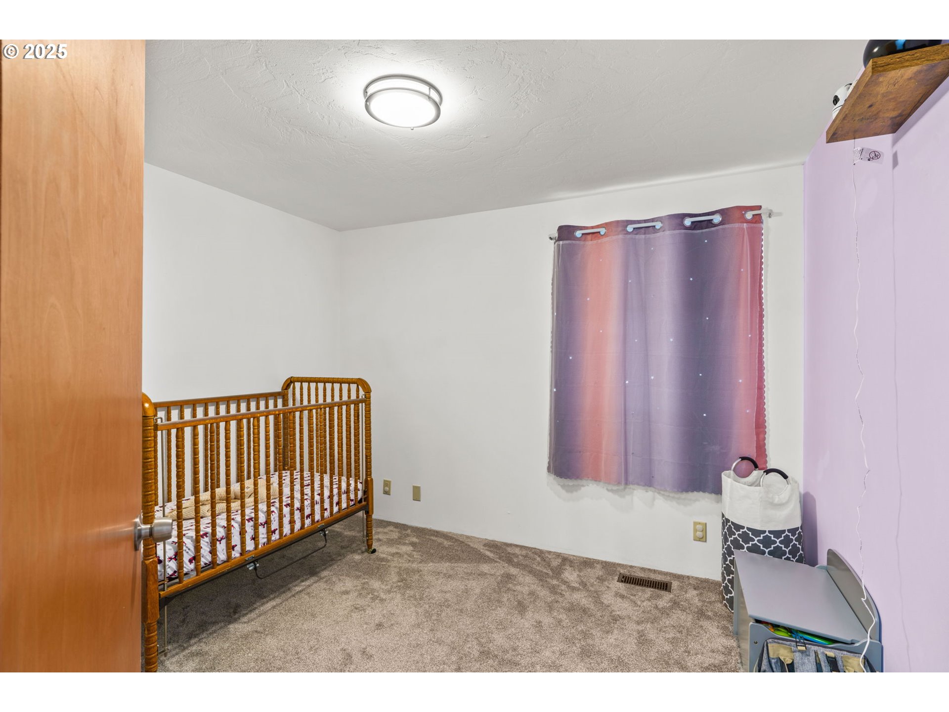 289 73rd Place Springfield, OR 97478 - Photo 17 of 32 a view of a room with a window and a bed