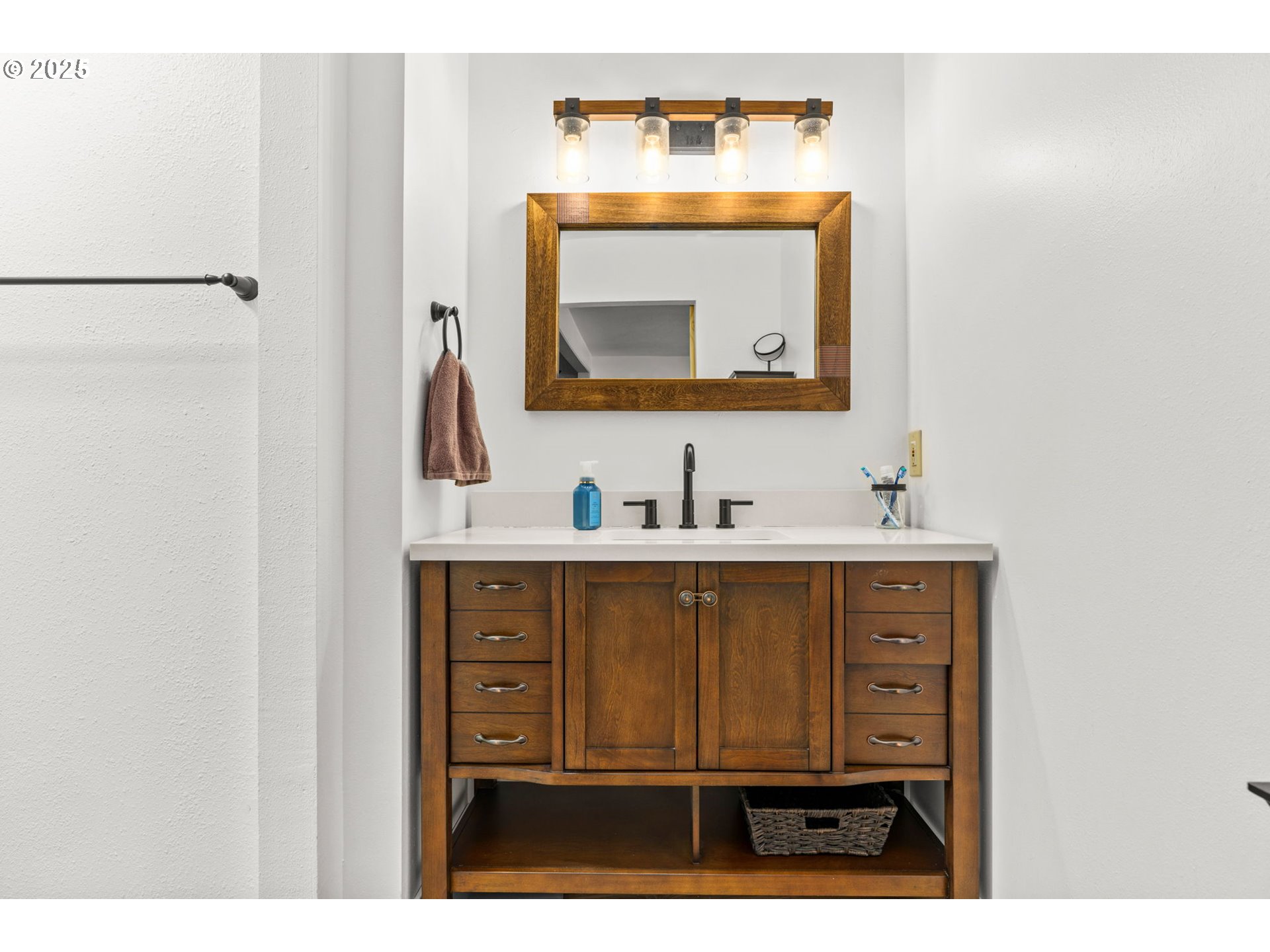 289 73rd Place Springfield, OR 97478 - Photo 25 of 32 a bathroom with a sink vanity and mirror