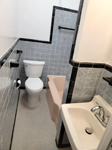 a view of an empty room with stairs