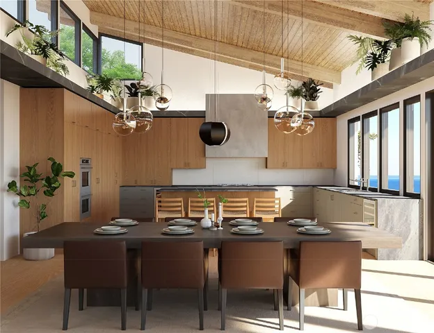 a kitchen with a table and chairs in it