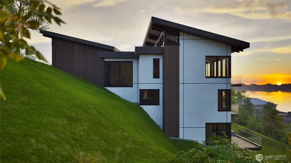 a front view of a house with yard