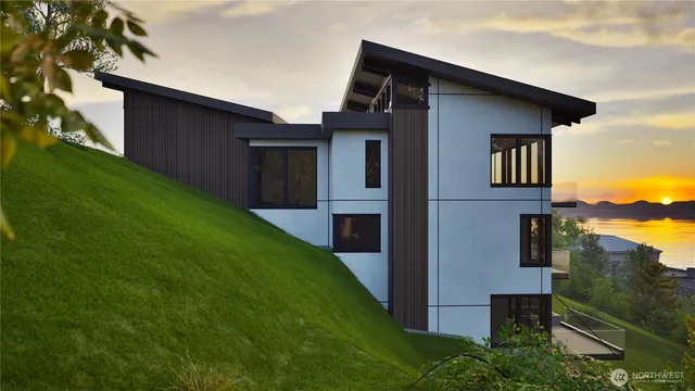 a front view of a house with yard