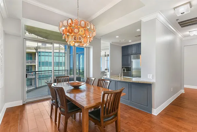 a kitchen with stainless steel appliances granite countertop a stove a sink dishwasher and a stove