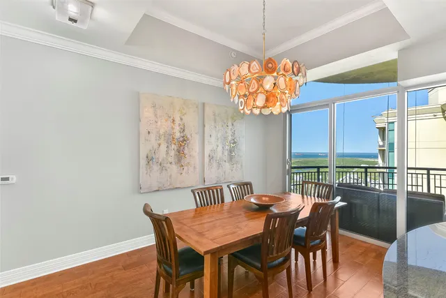 a kitchen with a sink appliances and a counter top space