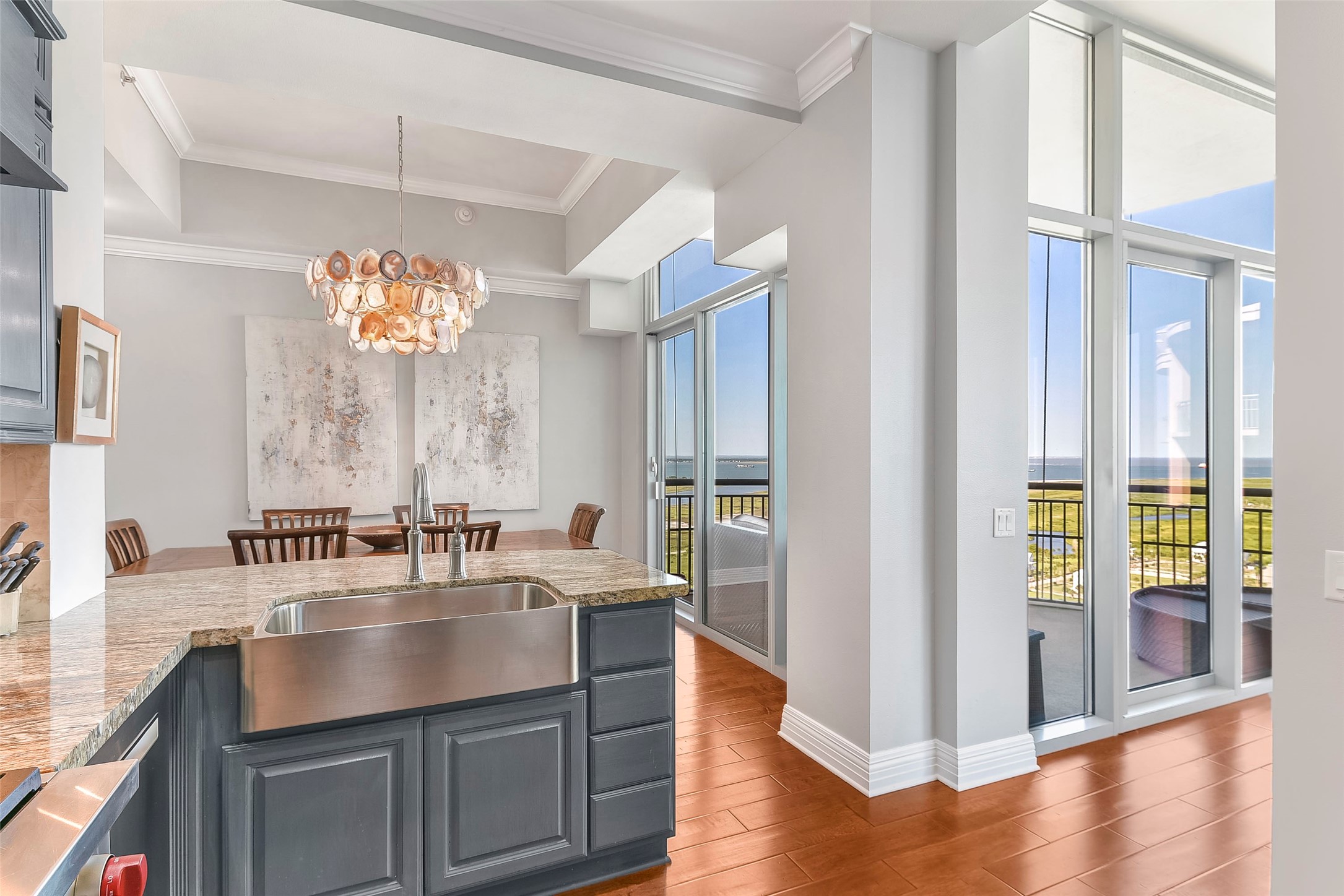 801 East Beach Drive, Unit TW2704 Galveston, TX 77550 - Photo 30 of 48 a kitchen with a sink appliances and a counter top space