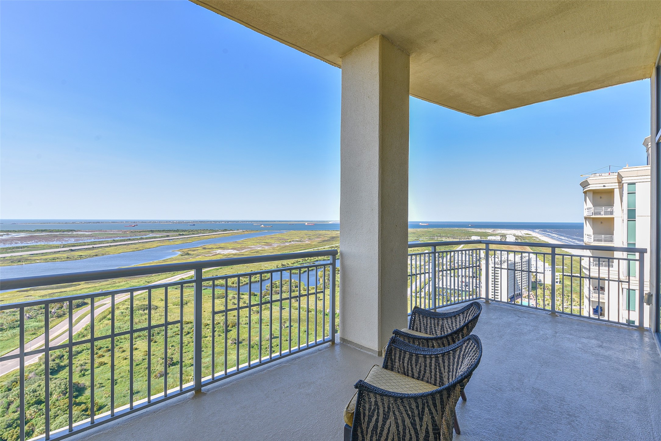 801 East Beach Drive, Unit TW2704 Galveston, TX 77550 - Photo 42 of 48 a view of balcony with chair