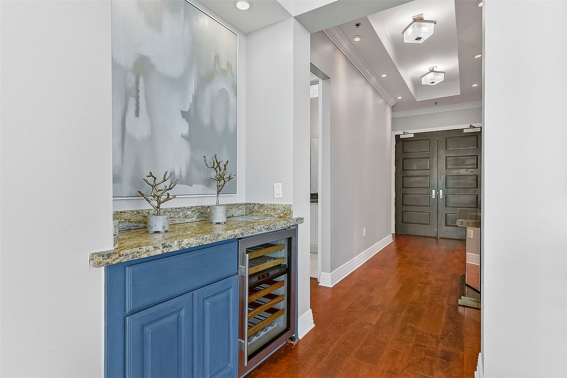 801 East Beach Drive, Unit TW2704 Galveston, TX 77550 - Photo 5 of 48 a bathroom with a granite countertop sink a mirror and shower