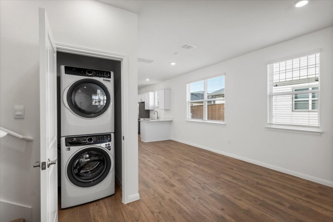 2620 Caleb Asher Loop Round Rock, TX 78665 - Photo 16 of 40 a view of a hallway with washer and dryer